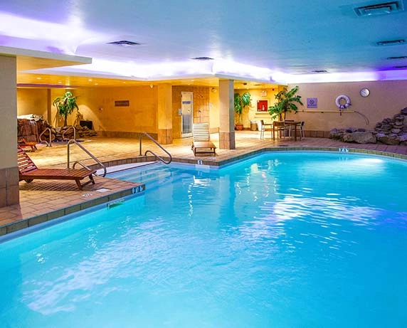 Indoor Pool With Sun Loungers
